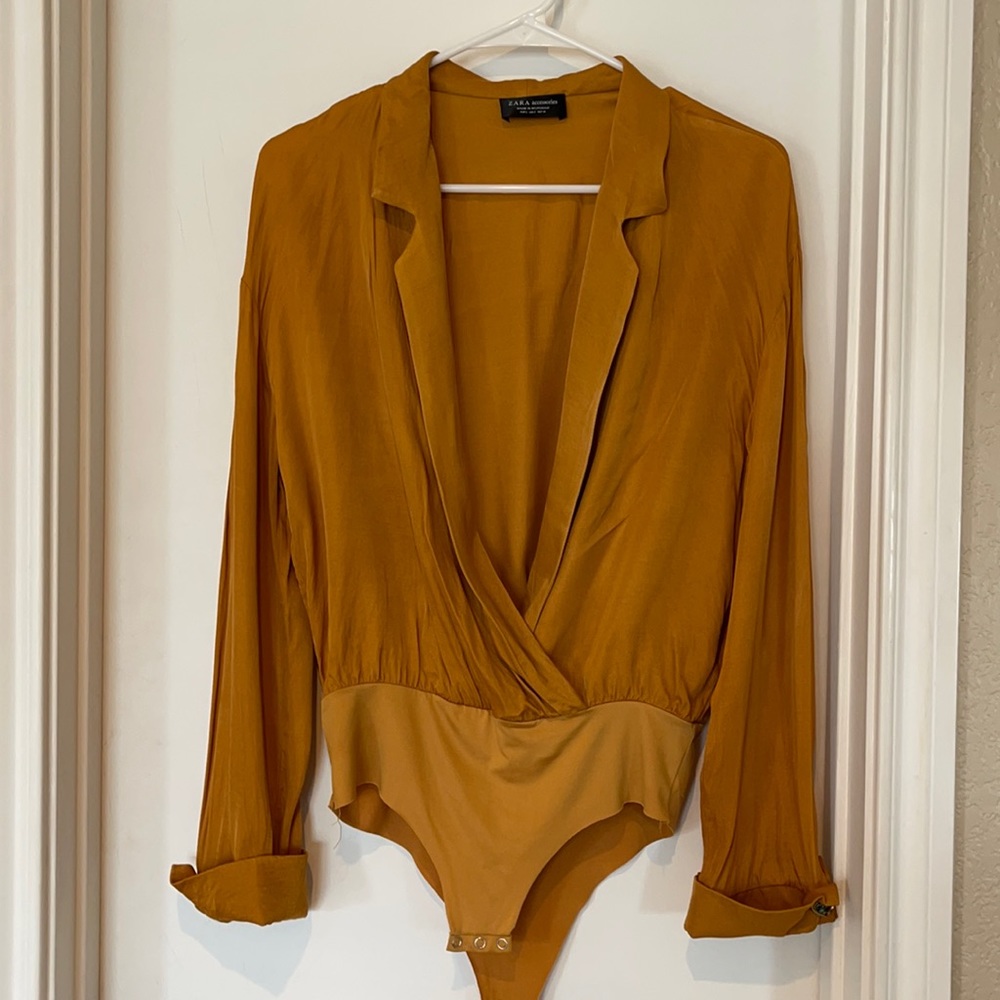Beautiful bloggers fav metallic bodysuit